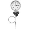 Gas in metal expansion thermometers