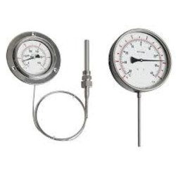 Gas in metal expansion thermometers